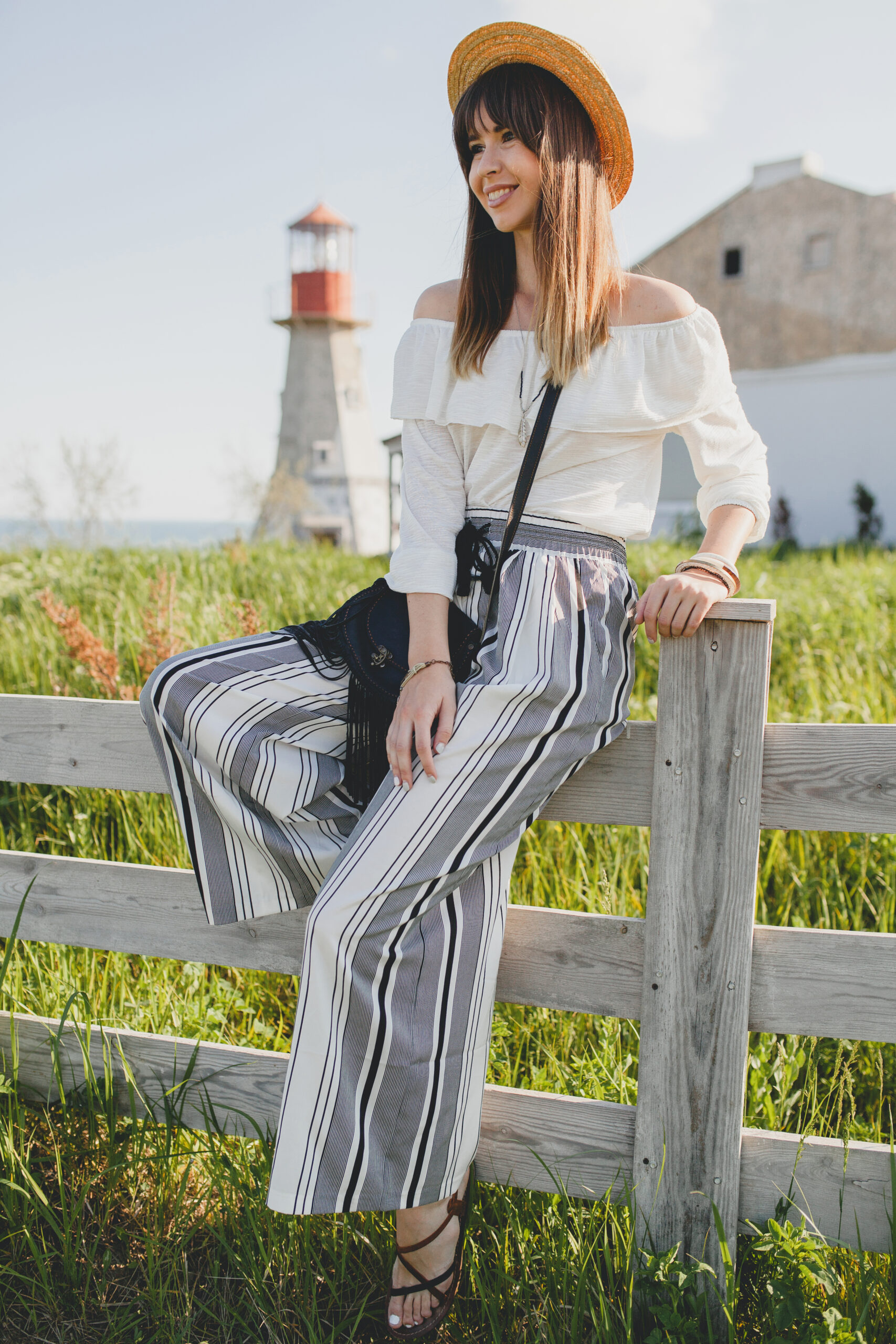 young woman with straw hat countryside scaled